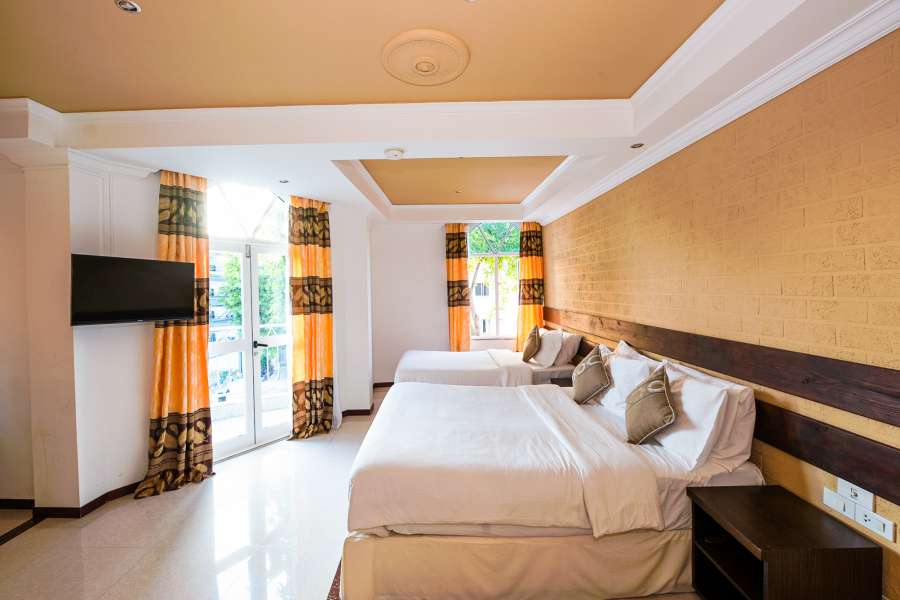 Deluxe Family room, - a double bed and single bed