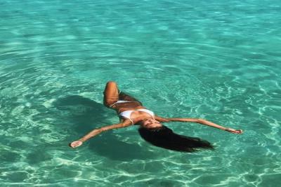 Relax and float in the clear blue water.